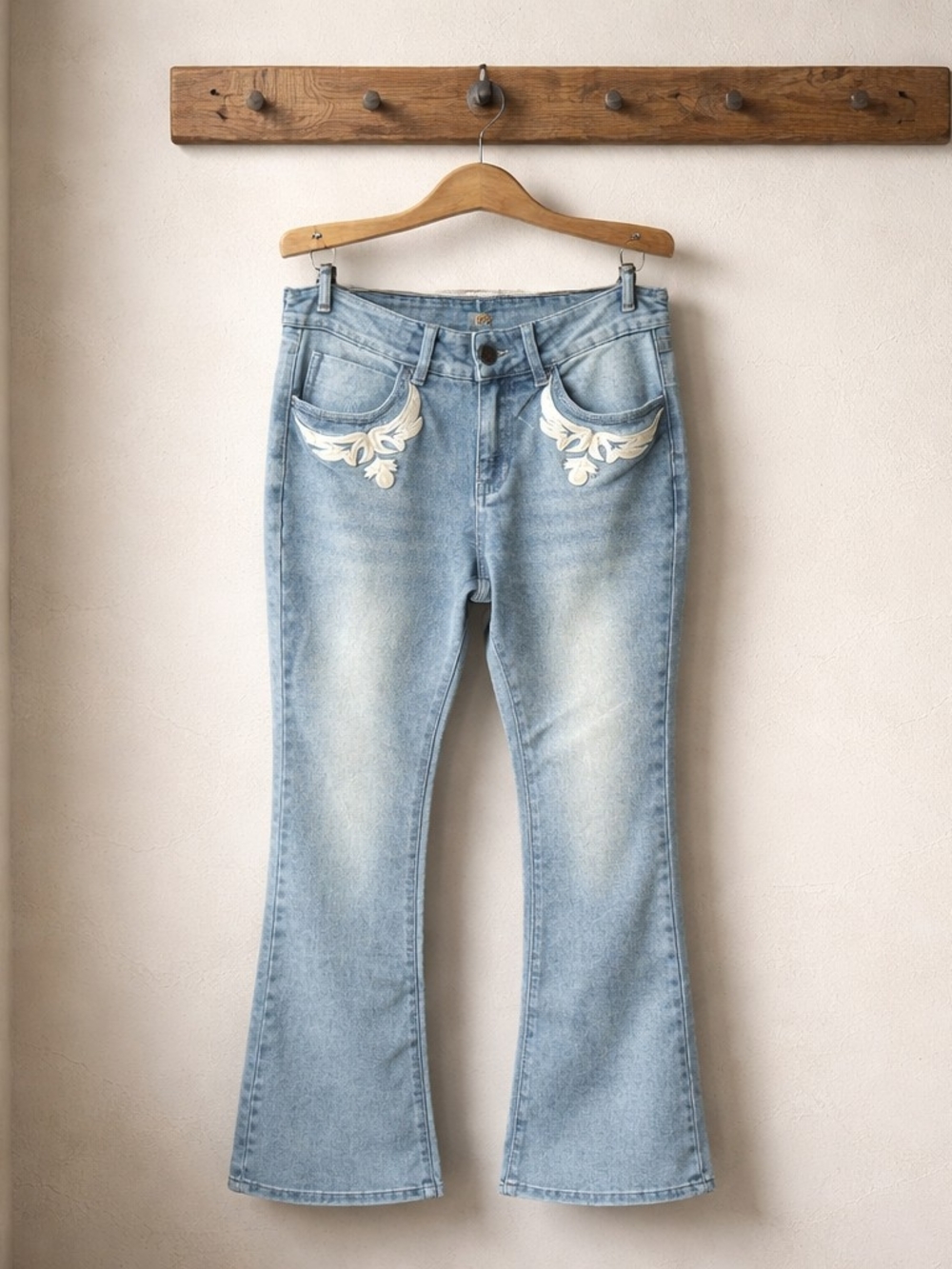 Light Wash Embroidered Pocket Flare Jeans - Women's